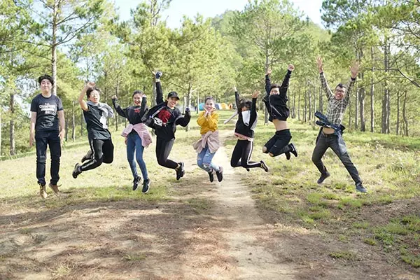 Group of teenagers jumping in the air