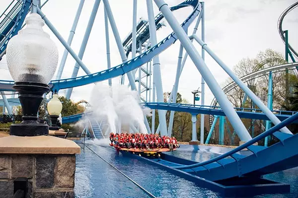 People riding a Griffon, a floorless B&M dive coaster, at Busch Gardens Williamsburg